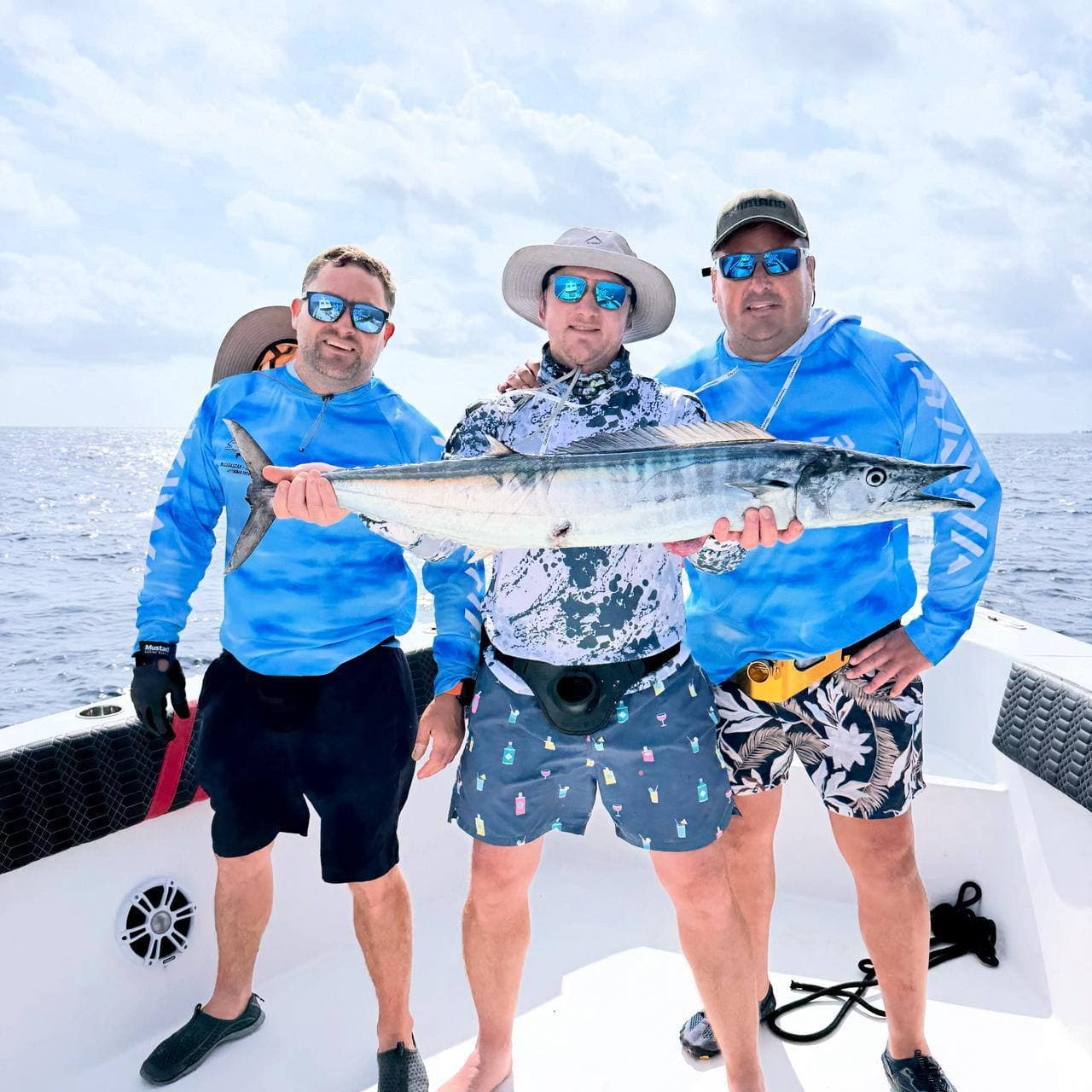 Guests enjoying their offshore catch on deck